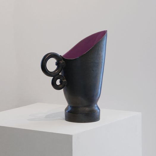 A Black Ceramic Jug