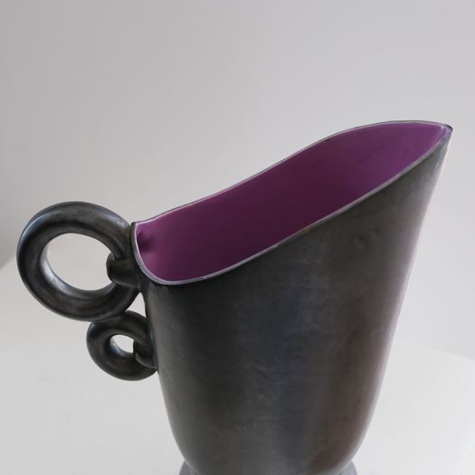 A Black Ceramic Jug