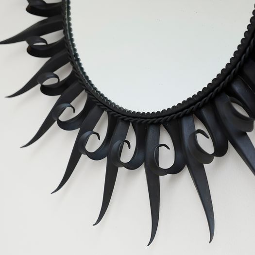 A Black Iron Sun Mirror
