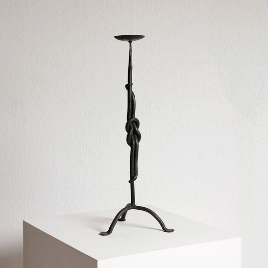 A Wrought Iron Candlestick