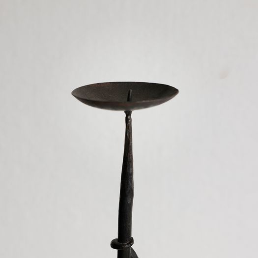 A Wrought Iron Candlestick