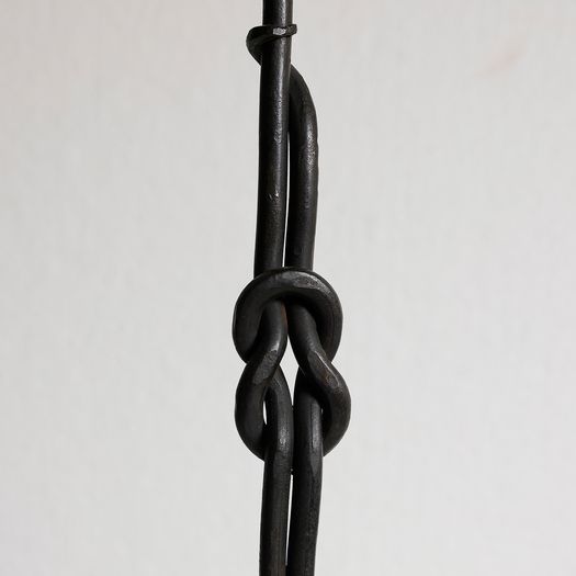 A Wrought Iron Candlestick