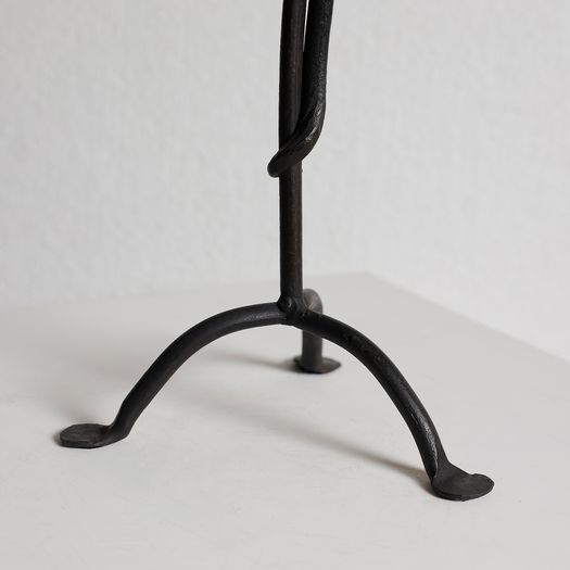 A Wrought Iron Candlestick