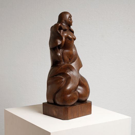 A Wooden Bather Figure