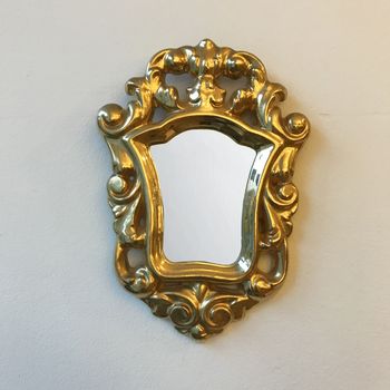A Gilt Pottery Mirror