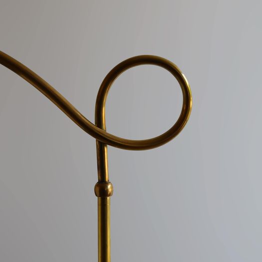 A Brass Loop Floor Lamp