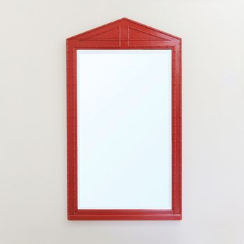 A Large Red Lacquer Mirror
