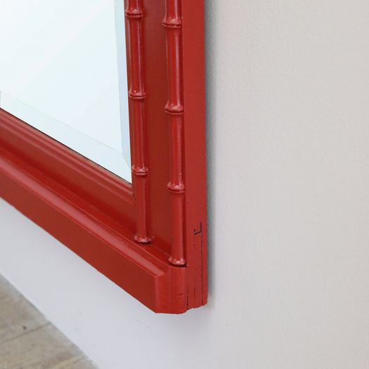 A Large Red Lacquer Mirror