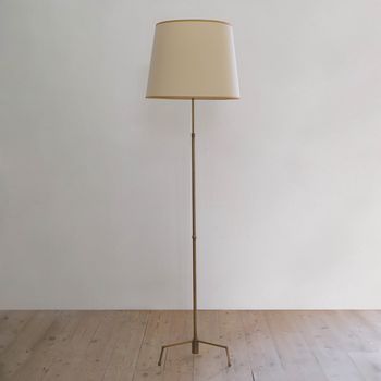 A Large Brass Floor Lamp