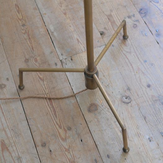 A Large Brass Floor Lamp