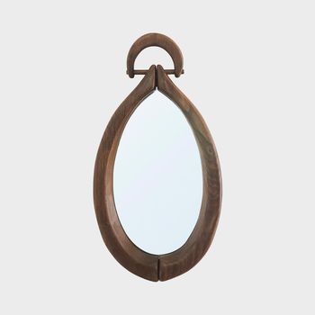 An Oval Wooden Mirror