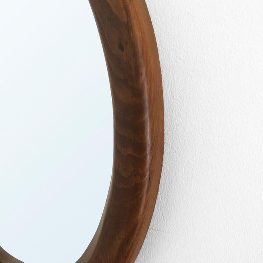 An Oval Wooden Mirror