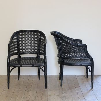 A Pair of Black Lacquer Chairs
