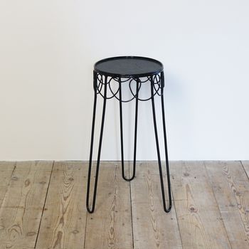 A Perforated Metal Side Table