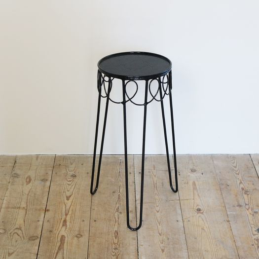 A Perforated Metal Side Table