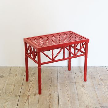 A Red Faux Bamboo Stool