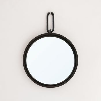 A Circular Steel Mirror