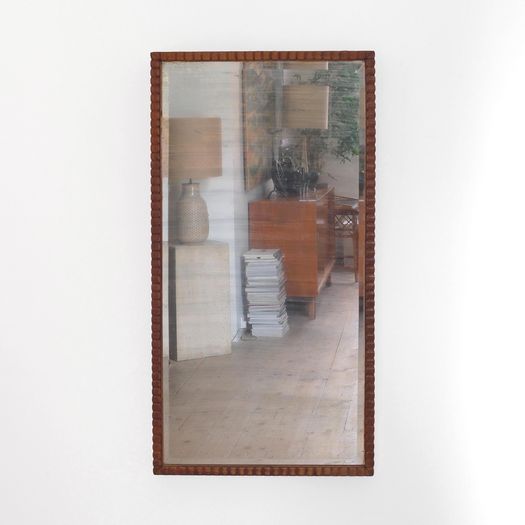 A Ridged Frame Mirror