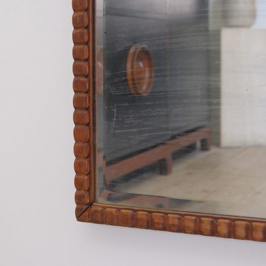 A Ridged Frame Mirror