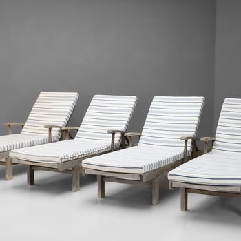 Four Teak Loungers