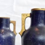 A pair of French mid 20th Century Terracotta Urns