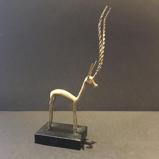 A Mid 20th Century Brass Antelope on Wooden Base