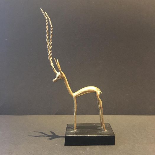 A Mid 20th Century Brass Antelope on Wooden Base