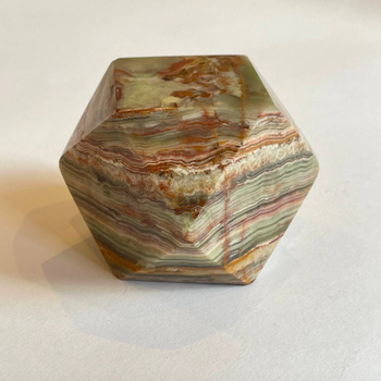 An Onyx Tetradecagon Desk Ornament