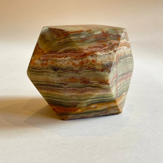 An Onyx Tetradecagon Desk Ornament