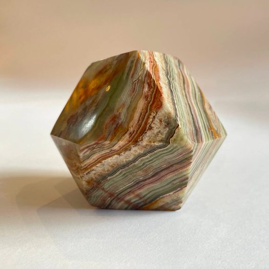 An Onyx Tetradecagon Desk Ornament