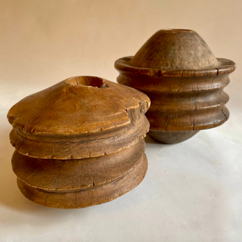 A Matched Pair of Tribal Pulleys