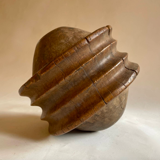 A Matched Pair of Tribal Pulleys