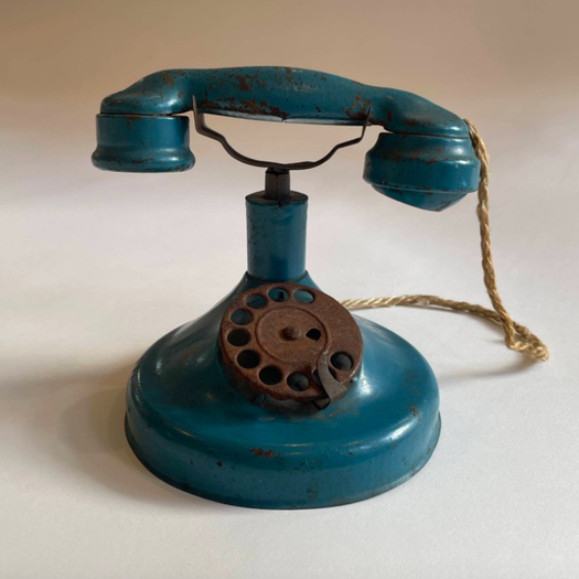 A Enamelled Tole Telephone