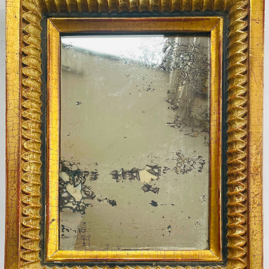 A Small Mirror in Gilt Frame