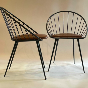 A Pair of Metal Corbeille Chairs