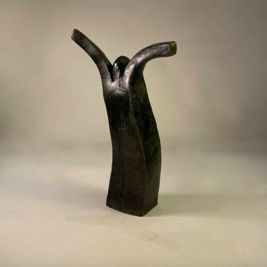 Bronze Sculpture of Jubilant Woman