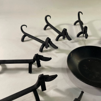 A Set of 12 French Knife Rests