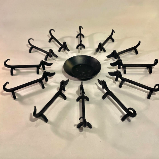 A Set of 12 French Knife Rests