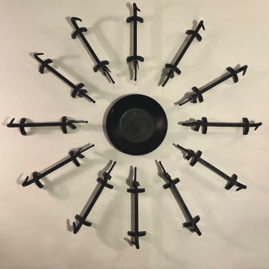 A Set of 12 French Knife Rests