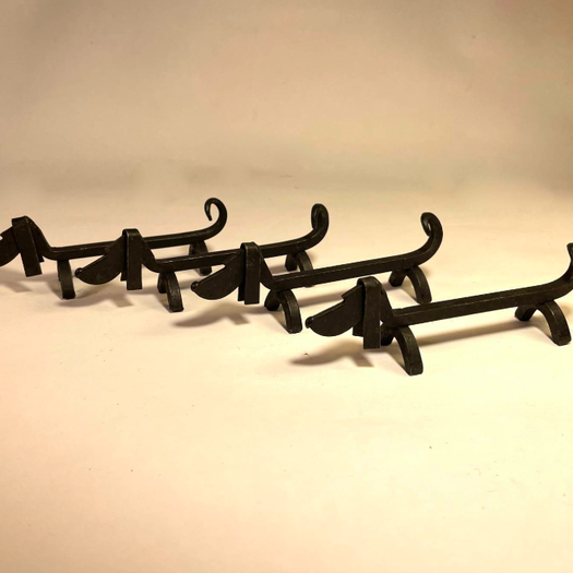 A Set of 12 French Knife Rests